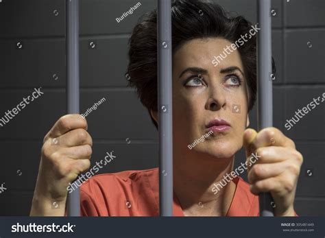 Caucasian Female Behind Bars Jail Cell Stock Photo Edit Now 305481449