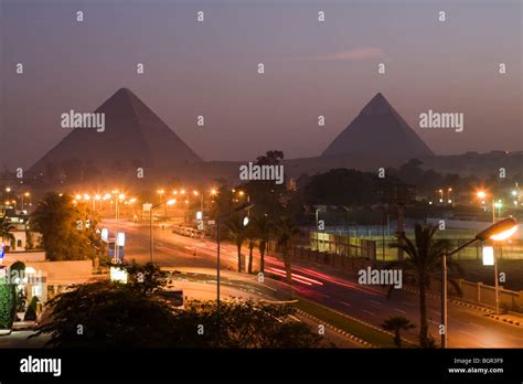 Shot of the Great Pyramids of Giza taken at night from view point in ...