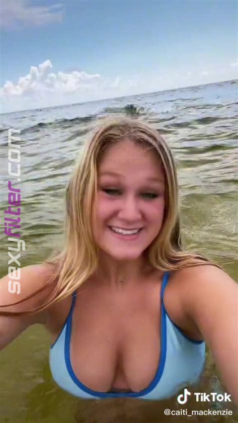 Sexy Caiti Mackenzie Shows Cleavage In Blue Bikini Top In The Sea