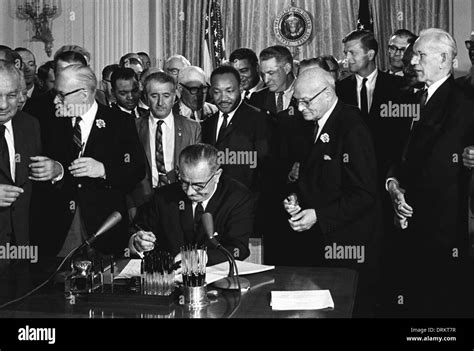 Us President Lyndon B Johnson Signs The 1964 Civil Rights Act As