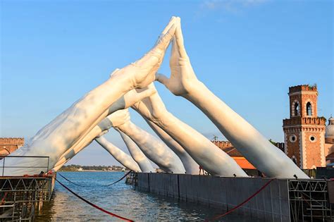 An Incredible Sculpture Of Human Hands Has Been Unveiled In Venice