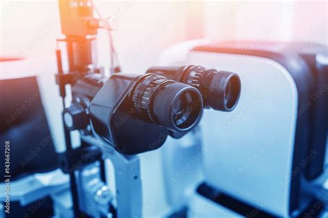 Slit lamp. Biomicroscope. Binoculars. Stock Photo | Adobe Stock