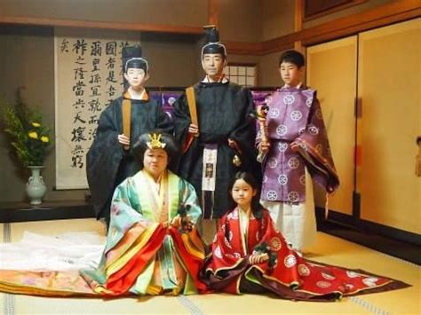 A Group Of People Dressed In Heian Robes At A Junihitoe Photography