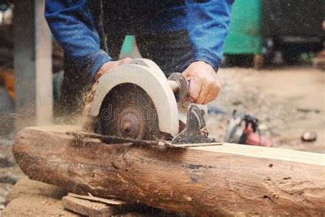 Carpenter Cutting Wood Using Table Saw At Site Stock Photo Image Of