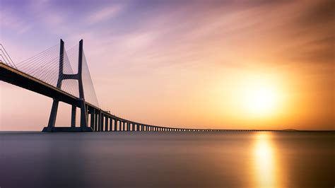 Vasco da Gama Bridge Sunset Portugal 4K 5K Wallpapers | HD Wallpapers | ID #27575