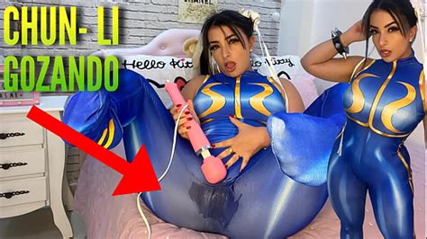 Sexy Cosplay Girl Dressed As Chun Li From Street Fighter Playing With