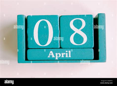 April 8 Blue Cube Calendar With Month Date Isolated On White