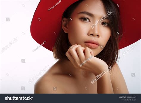 Beauty Face Smiling Asian Woman Touching Stock Photo 2038059467