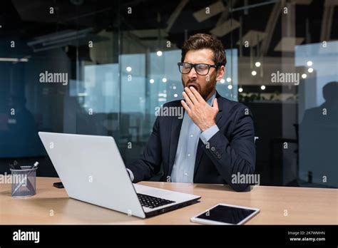 Mature Bored Businessman Working Inside Modern Office Building Boss In