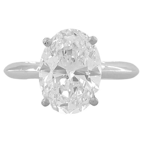 Tiffany and Co. 5 Carat Platinum Oval Cut Diamond Solitaire Engagement Ring. For Sale at 1stDibs