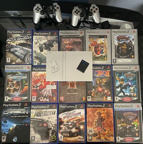 Silver Sony PlayStation 2 slim console w/ 17 games, 2 ctrl & mc | in ...