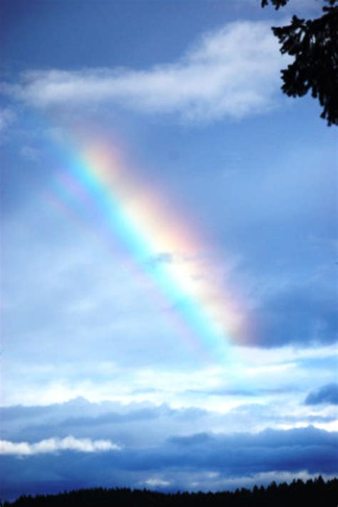 Rainbow Storm Clouds Photograph by Tom Bohon - Fine Art America