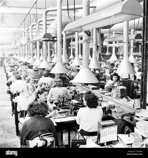 1950s Historical Picture Factory Workers Hi Res Stock Photography And