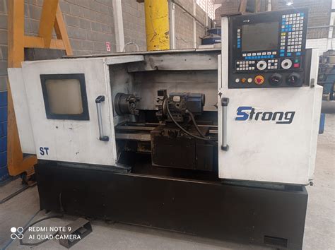 TORNO CNC STRONG 500MM X 1000MM ANO 2010 Operatrix