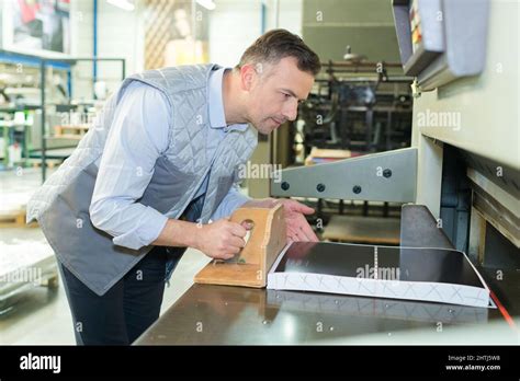 man printing press cutting machine Stock Photo - Alamy