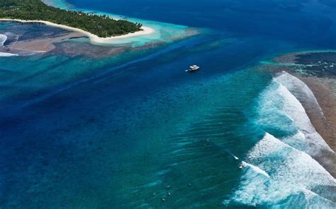 Visit Maldives - Experiences > Surfing the Waves of Sustainability