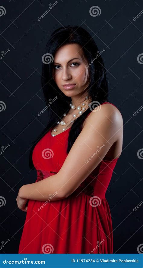 Picture Of Brunette In Red Dress Stock Photo Image Of Beads Elegant