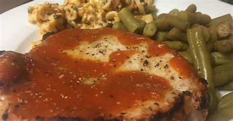 Lemon Pepper Chop Slathered In Vinegar Based Bbq Sauce Green Beans And Roasted Tomato Pasta