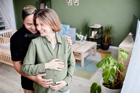 Pregnant Lesbian Couple Expecting Baby Stock Photo By Seventyfourimages