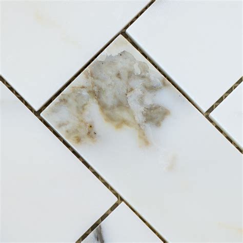 CALACATTA GOLD / HERRINGBONE LARGE | Designer Marble