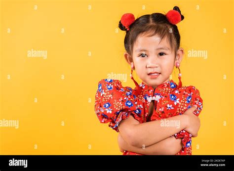 Happy Asian Chinese Little Girl Smile Wear Red Cheongsam Crossed Arms