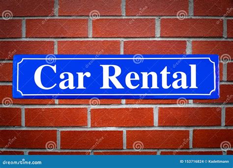 Car Rental Street Sign on Brick Wall Stock Photo - Image of automobile ...