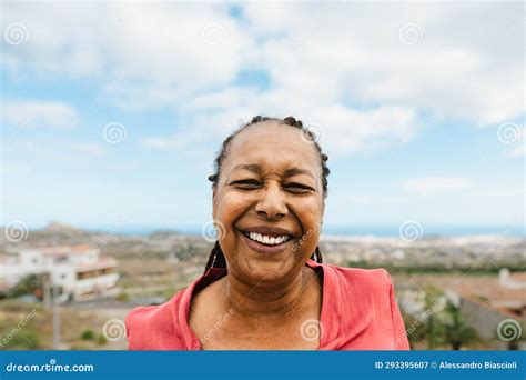 Happy Senior African Woman Having Fun Smiling Into The Camera Stock