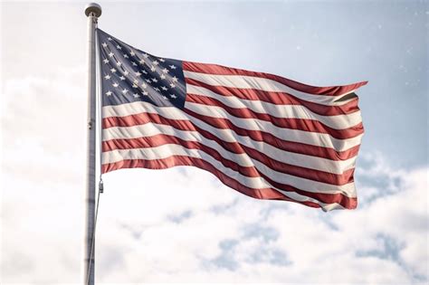 Premium AI Image National Waving Flag Of United States On Pole