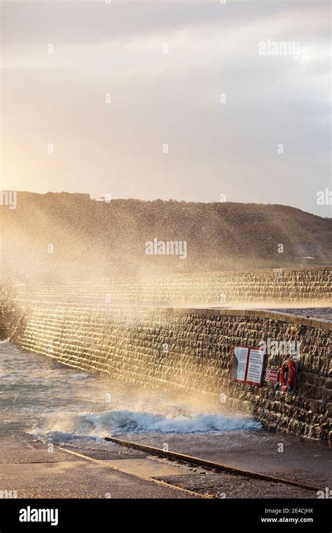 Harbor Wall At Storm Surge Goury Hi Res Stock Photography And Images