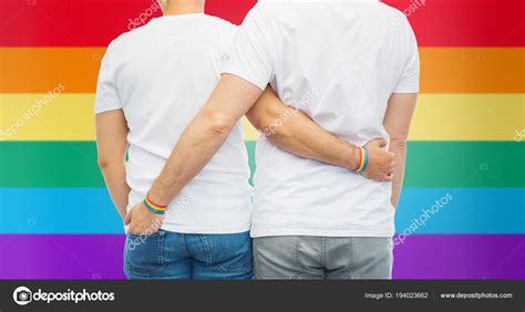 Male Couple With Gay Pride Rainbow Wristbands Stock Photo Syda