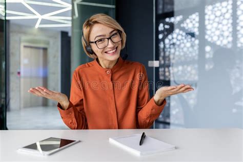 Web Camera View Blonde Woman Looking Into Web Camera And Talking To Colleagues Smiling
