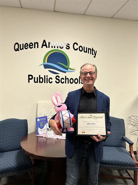 Peter Pucci Receives The Energizer Bunny Award From Dr Patty Salelens