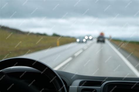 Premium Photo | Driving a car perspective of a driver bokeh effect