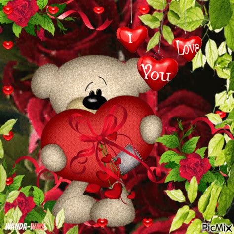 A Teddy Bear Holding A Red Heart With The Words I Love You On It