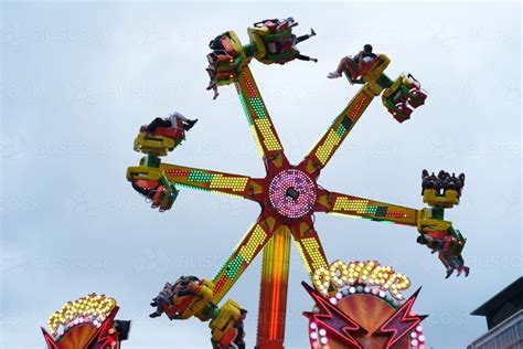 Image Of Spinning Ride In Motion At The Carnival Austockphoto