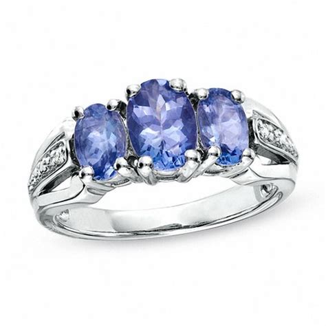 Oval Tanzanite Three Stone Ring In Sterling Silver With Diamond Accents