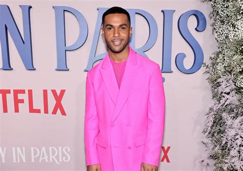 Emily In Paris Actor Sports Suave Barbiecore Suit Parade