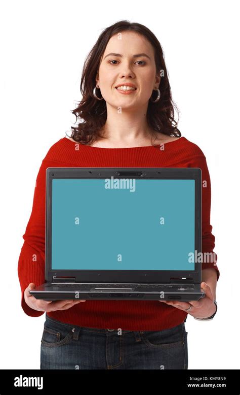 Portrait Of A Pretty Young Woman Holding A Laptop Standing Isolated On