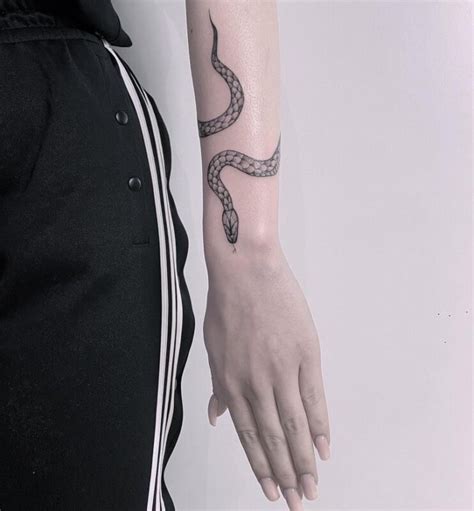 Share More Than Snake Wrapped Around Tattoo In Cdgdbentre