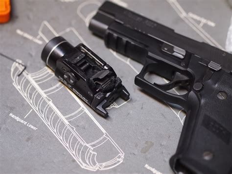 Mister Donut's Firearms Blog: Streamlight TLR-1 battery cap plastic ...