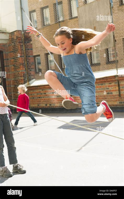 Girl 8 9 Jumping Rope Hi Res Stock Photography And Images Alamy