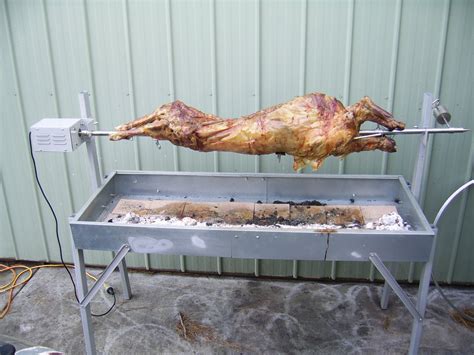 Outdoor Cooking With Charcoal How To Spit Roast A Lamb