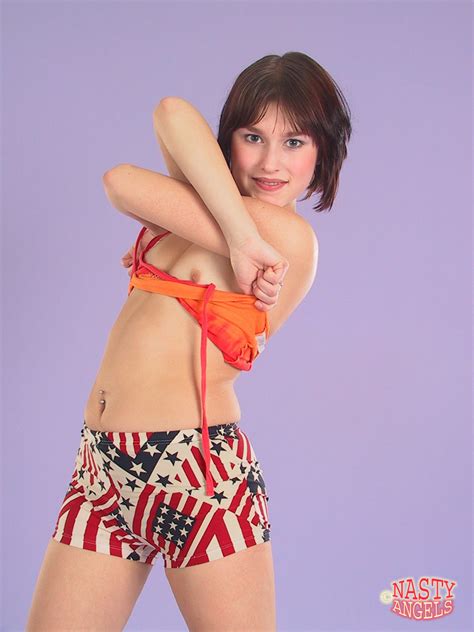 White Teen Lida Does A Slow Striptease Prior To Modeling In The Nude