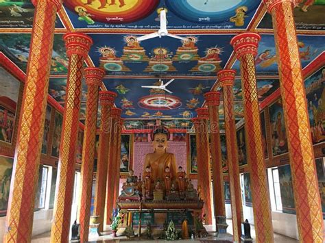 Buddha Statue And Murals At Wat Preah Prom Rath Temple In Siem Reap