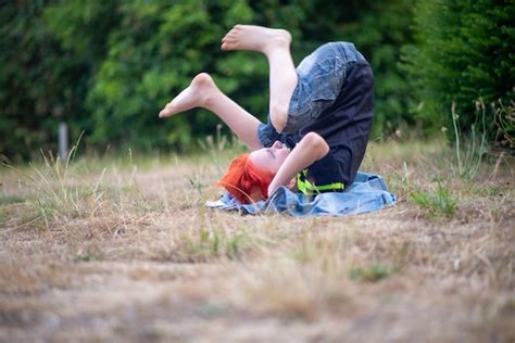 Premium Photo A Person Is Laying On A Blanket With Their Feet Up In