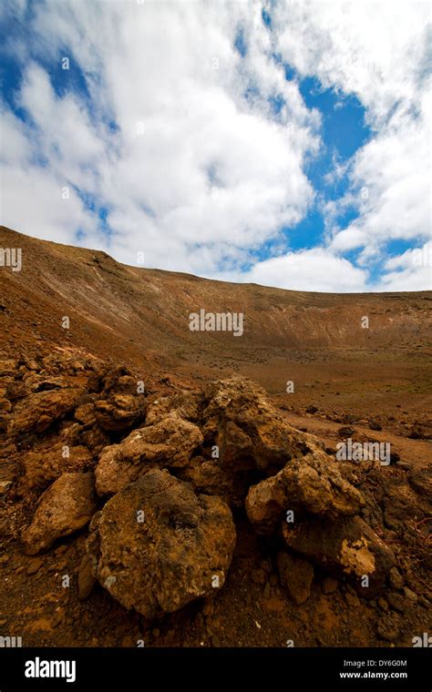 Stone In Los Volcanes Lanzarote Spain Volcanic Timanfaya Rock Sky Hill