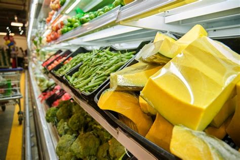 Premium Photo Fruits And Vegetables On The Shelves At A Supermarket