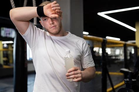 Free Photo Medium Shot Tired Man Holding Drink