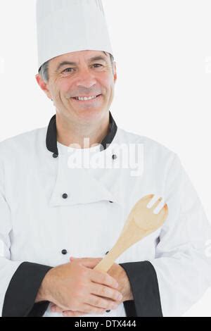 Happy Mature Chef Holding Spatula Stock Photo Alamy