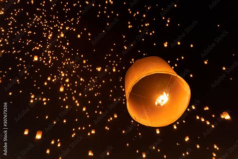 Thai People Release Sky Floating Lanterns Or Lamp To Worship Buddhas